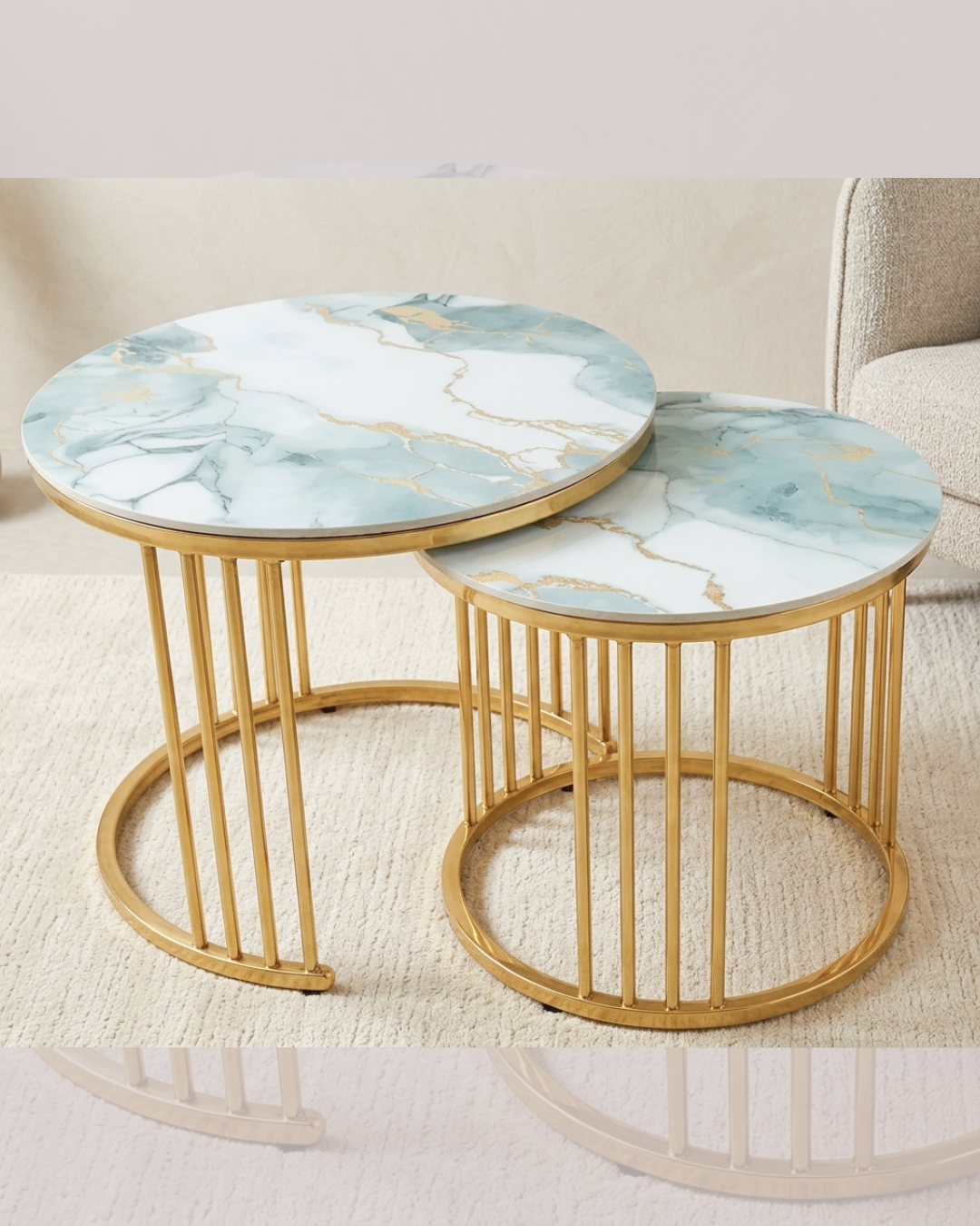 Nesting round marble center table set with ocean blue patterns and polished gold metal rod frames