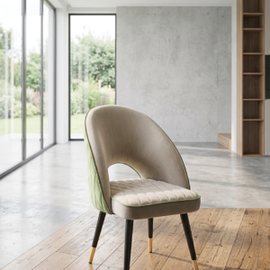 Modern Velvet Chair with green upholstery and black-gold legs in a home setting.