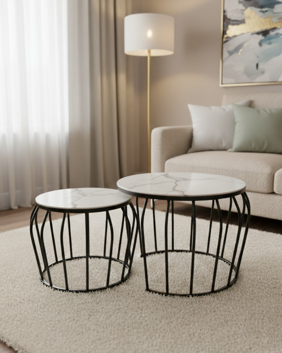 Set of two modern Nesting Coffee Tables with white marble-finish tops and black metal cage-style bases