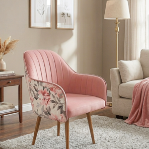 Premium pink velvet accent chair with wooden-finish metal legs and floral back design