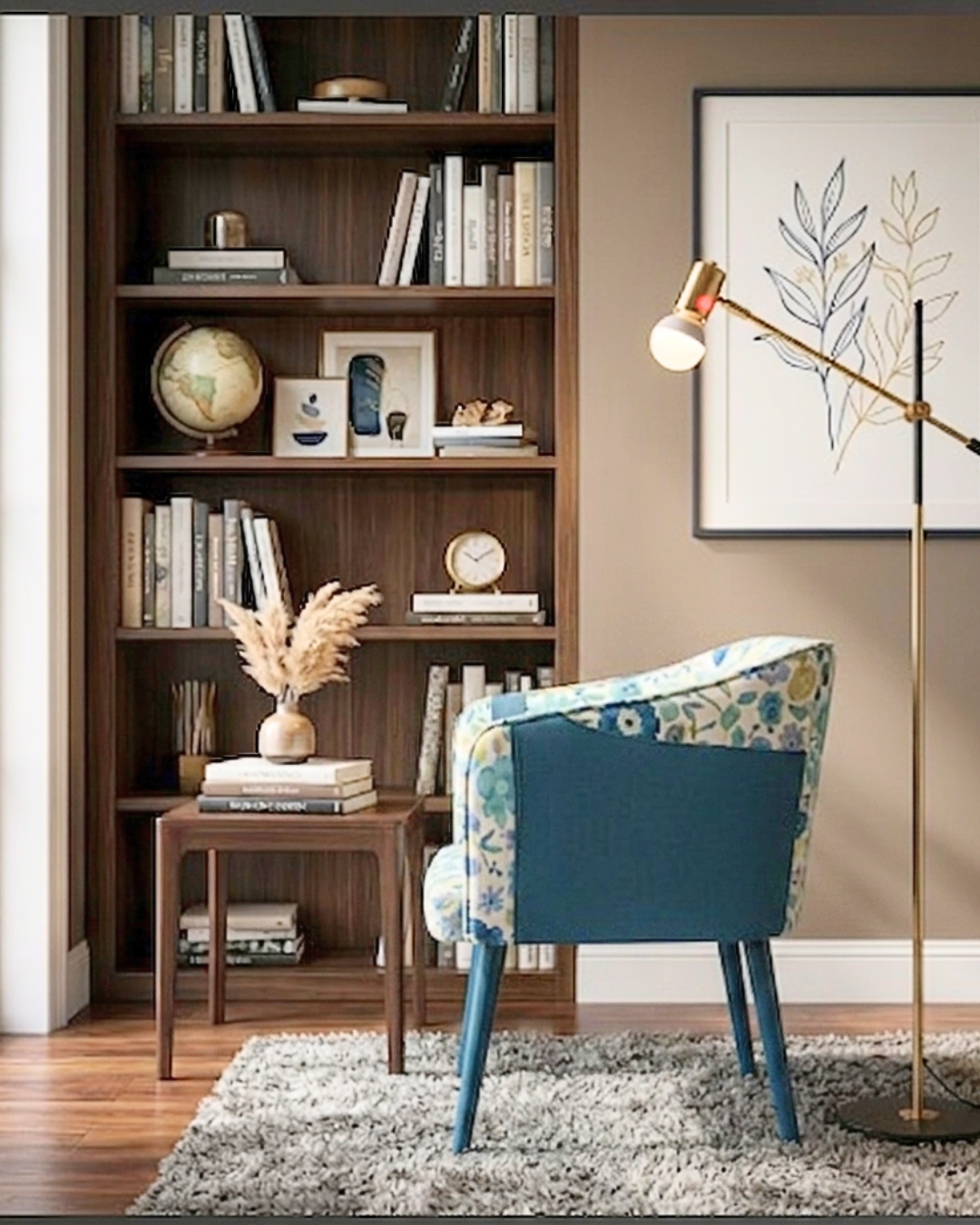 Front view of a stylish Floral Accent Teal Armchair with ergonomic design.