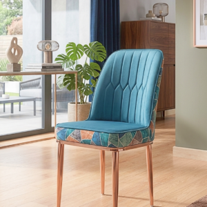 Modern Velvet Dining Chair with rose-gold legs and geometric pattern back.