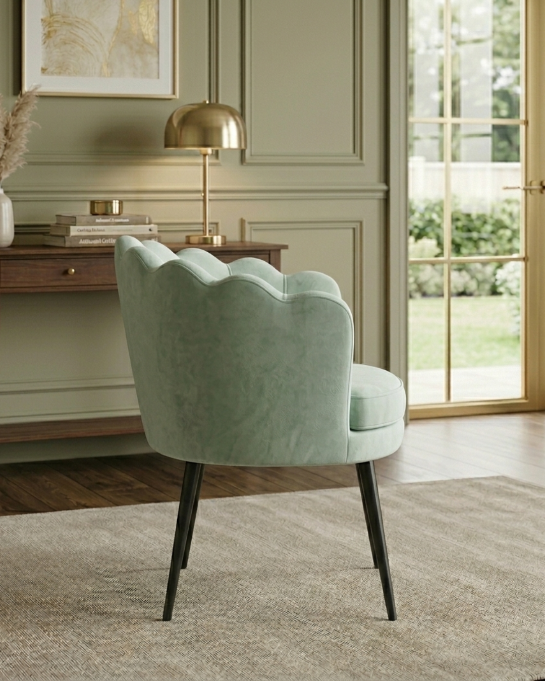 Scalloped velvet accent chair in mint green with vertical sea shell tufting and matte black metal legs
