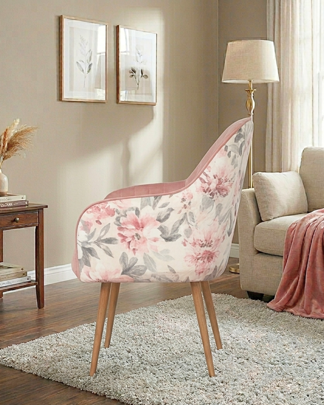 Premium pink velvet accent chair with wooden-finish metal legs and floral back design