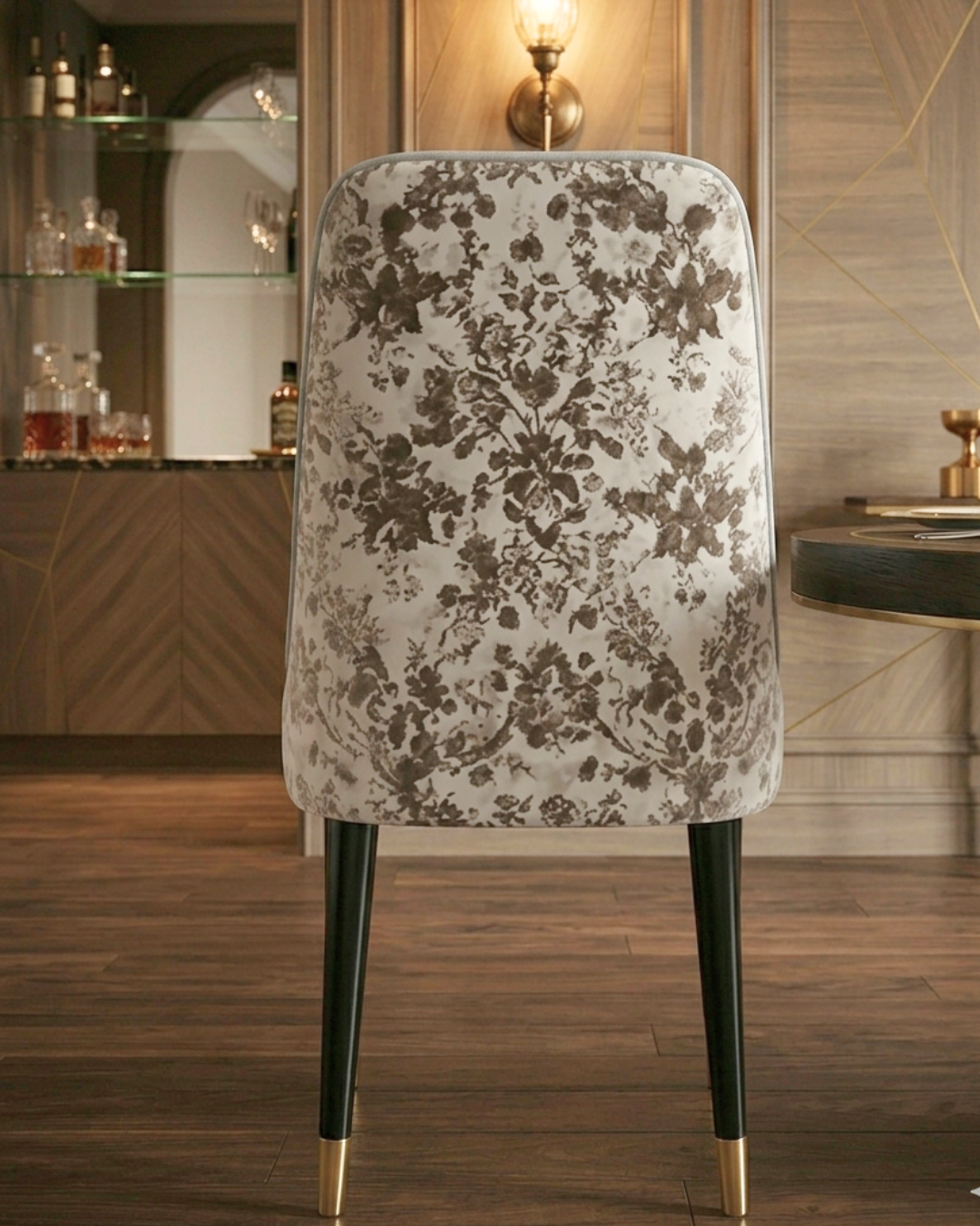 Luxury Floral Dining Chair with gold-tipped black metal legs in a luxury dining room setup