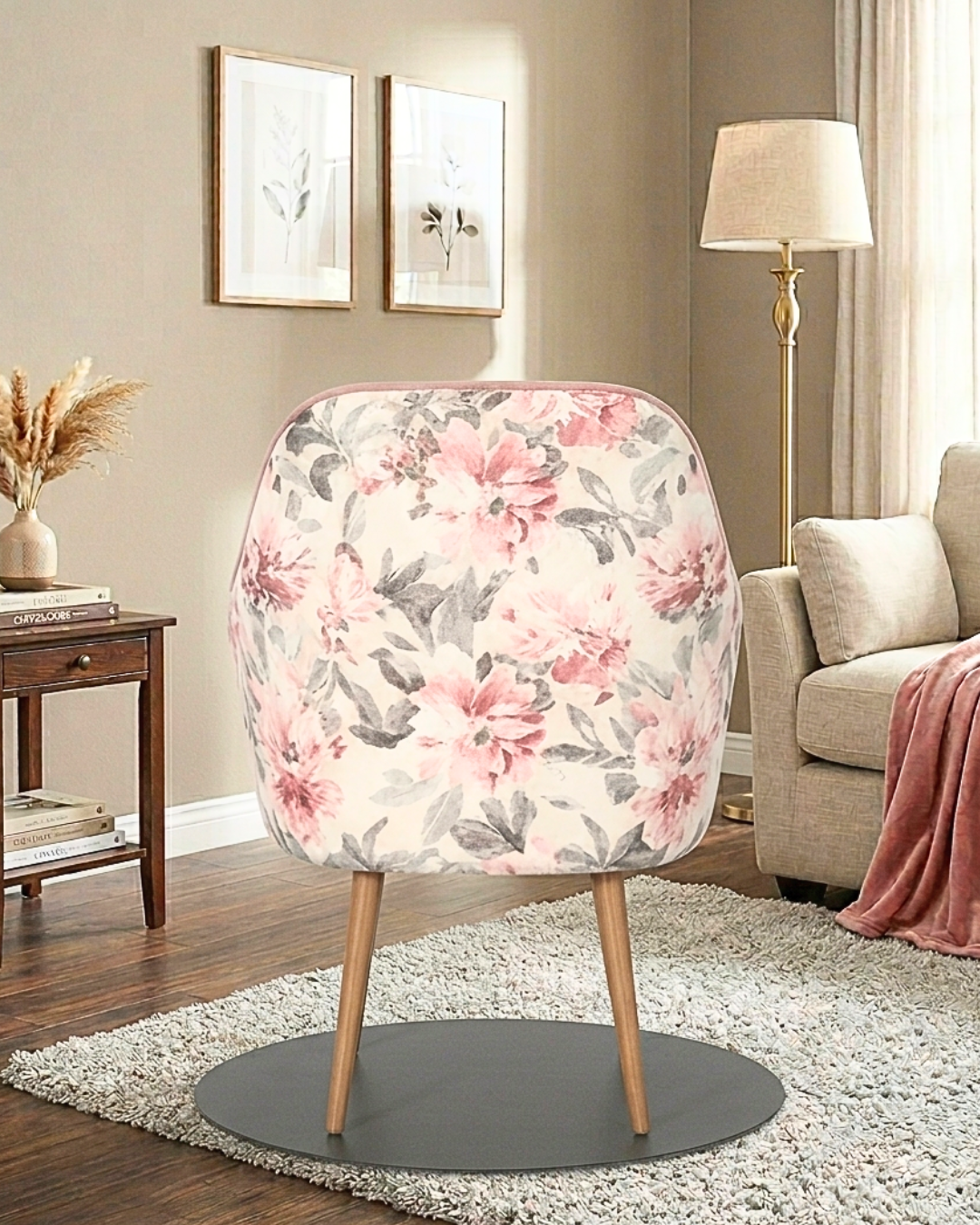 Premium pink velvet accent chair with wooden-finish metal legs and floral back design
